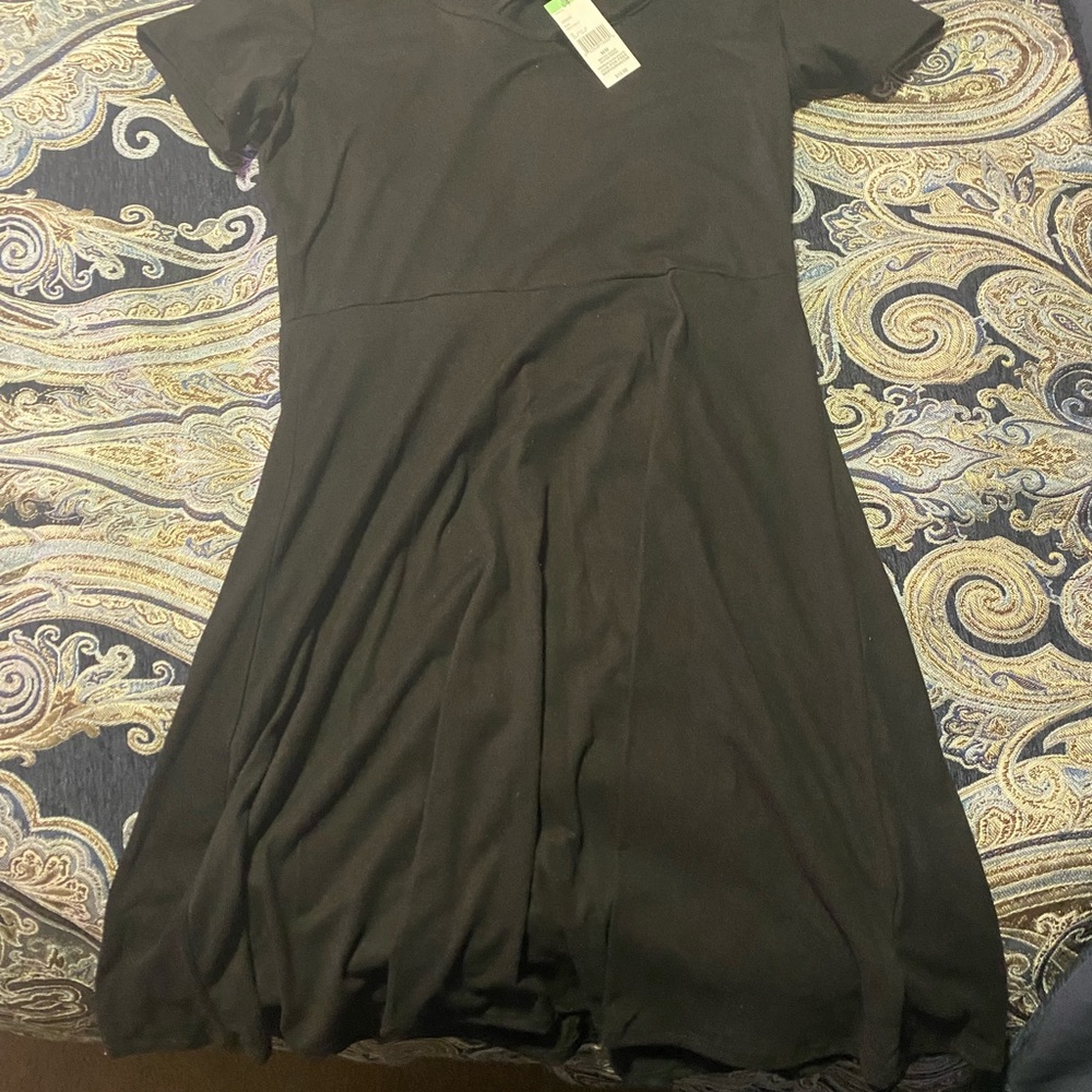 Two long sleeve dresses and one shirt sleeve.
